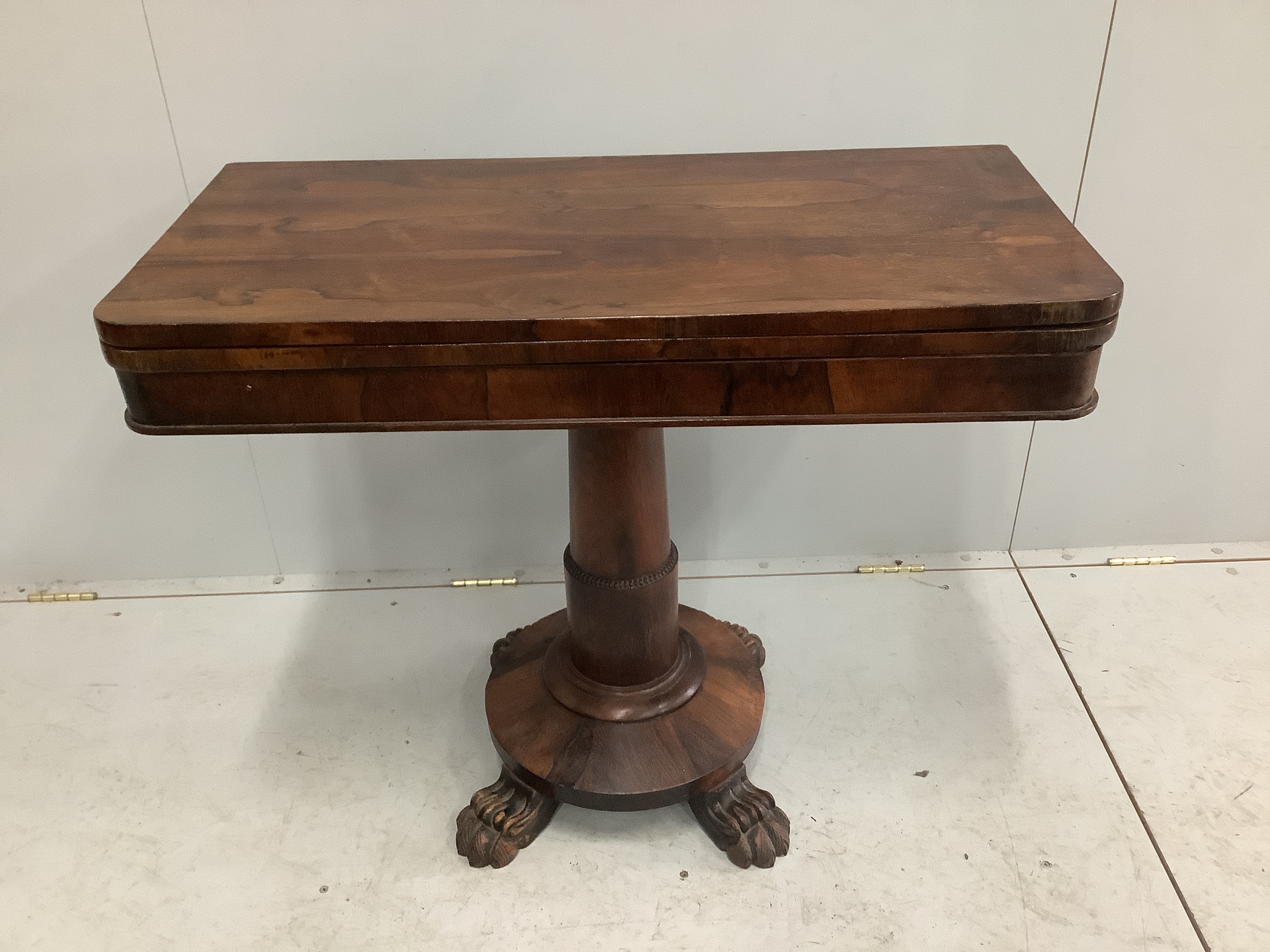 An early Victorian rectangular rosewood folding card table, width 92cm, depth 44cm, height 74cm